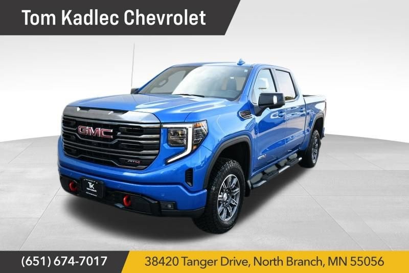 2024 GMC Sierra 1500 AT4 in Dynamic Blue Metallic — front three-quarter view